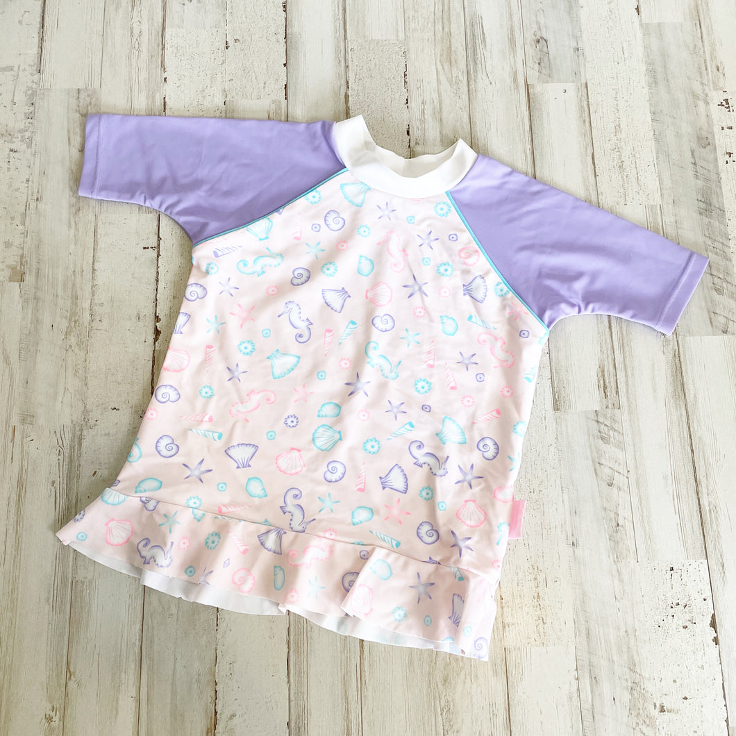 Platypus Australia | Girl's Pink and Purple Seahorse and Seashell Short Sleeve Swim Top | Size: 4T