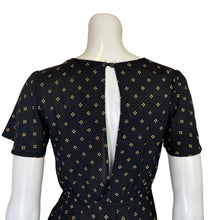 Load image into Gallery viewer, Flynn Skye | Womens Black and Gold Pattern Short Sleeve Romper | Size: S
