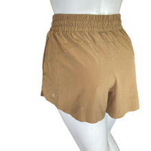 Load image into Gallery viewer, Athleta | Women&#39;s Tan Slit Side Shorts | Size: XS
