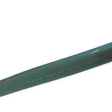 Load image into Gallery viewer, Close-up of Tiffany &amp; Co logo on sunglass temple
